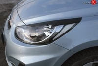 Hyundai Solaris (седан) 2010 —2013 Накладки на передние фары (реснички) компл 2шт. глянец (под покраску)