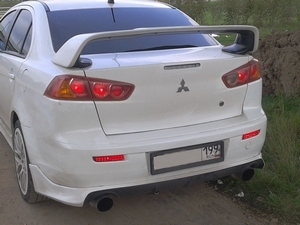 Накладка на задний бампер Zodiak для Mitsubishi Lancer X (два выхлопа)