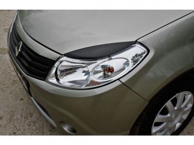Renault Sandero 2009—2013 Накладки на передние фары (реснички) 2шт. глянец (под покраску) - Тюнинг ВАЗ Лада VIN: RE-22040. 